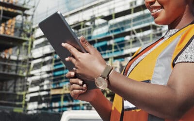 Female construction worker holding an IPad at a jobsite